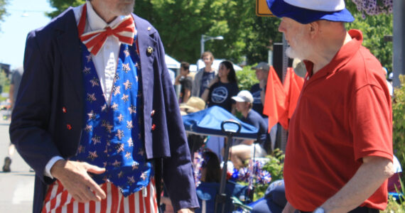 Molly Hetherwick/Kitsap News Group photos
Uncle Sam chats with a patriotic visitor at the parade.