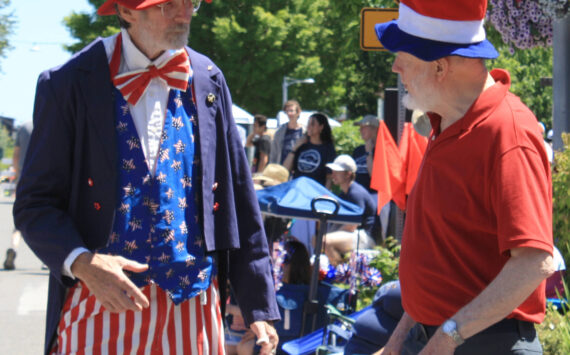 Molly Hetherwick/Kitsap News Group photos
Uncle Sam chats with a patriotic visitor at the parade.