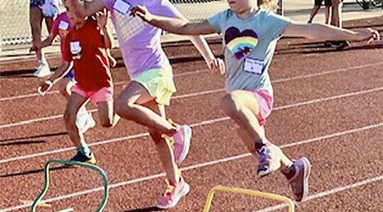 BI Kiwanis courtesy photos
Young girls jump over small hurdles in one of the events.