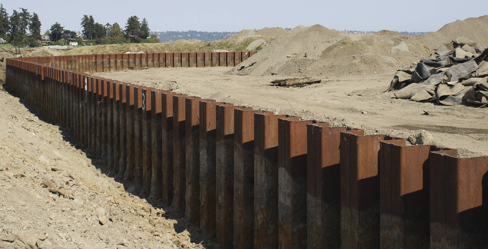 The failing sheet metal wall at the Wyckoff Superfund Site, replacement of which is slated to begin by early 2025.