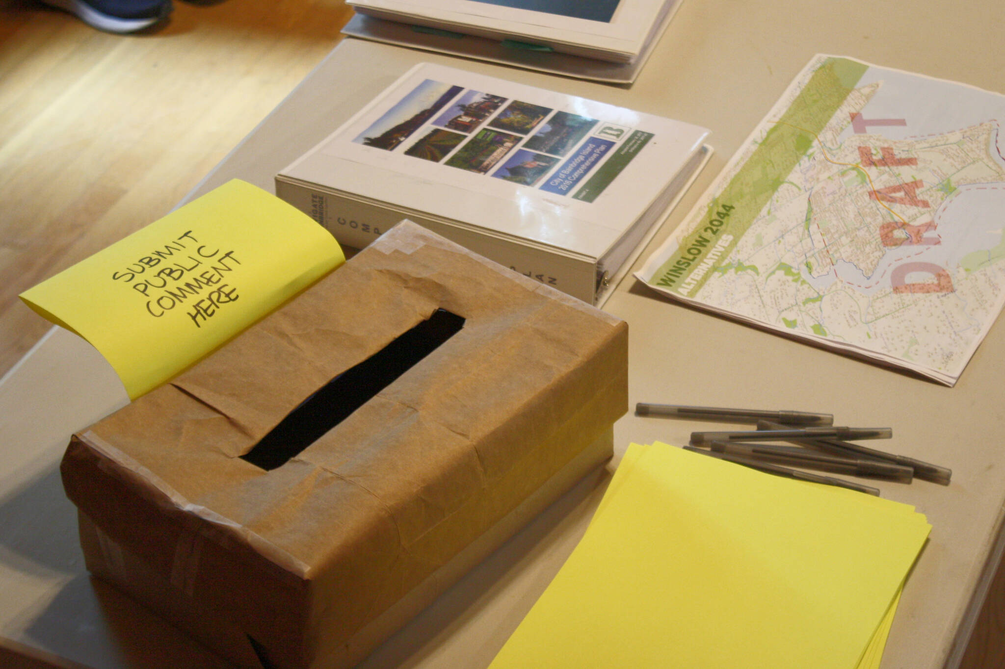 An official public comment submission box, with a copy of the Draft Environmental Impact Statement for public review.