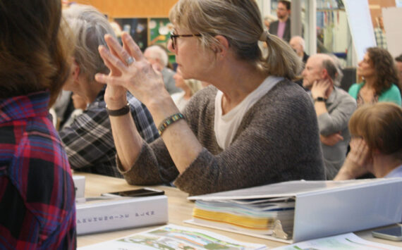 Molly Hetherwick/Kitsap News Group
BI residents consider the impacts of potential growth during a Q&A session at the Comprehensive Plan Open House.