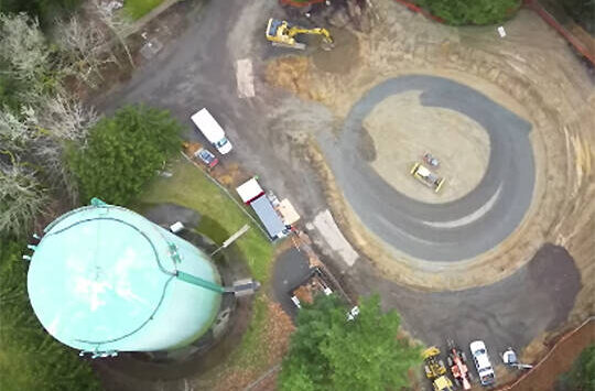 COBI courtesy photos
This shot from above shows the old water tank at left and where the new one is being constructed.