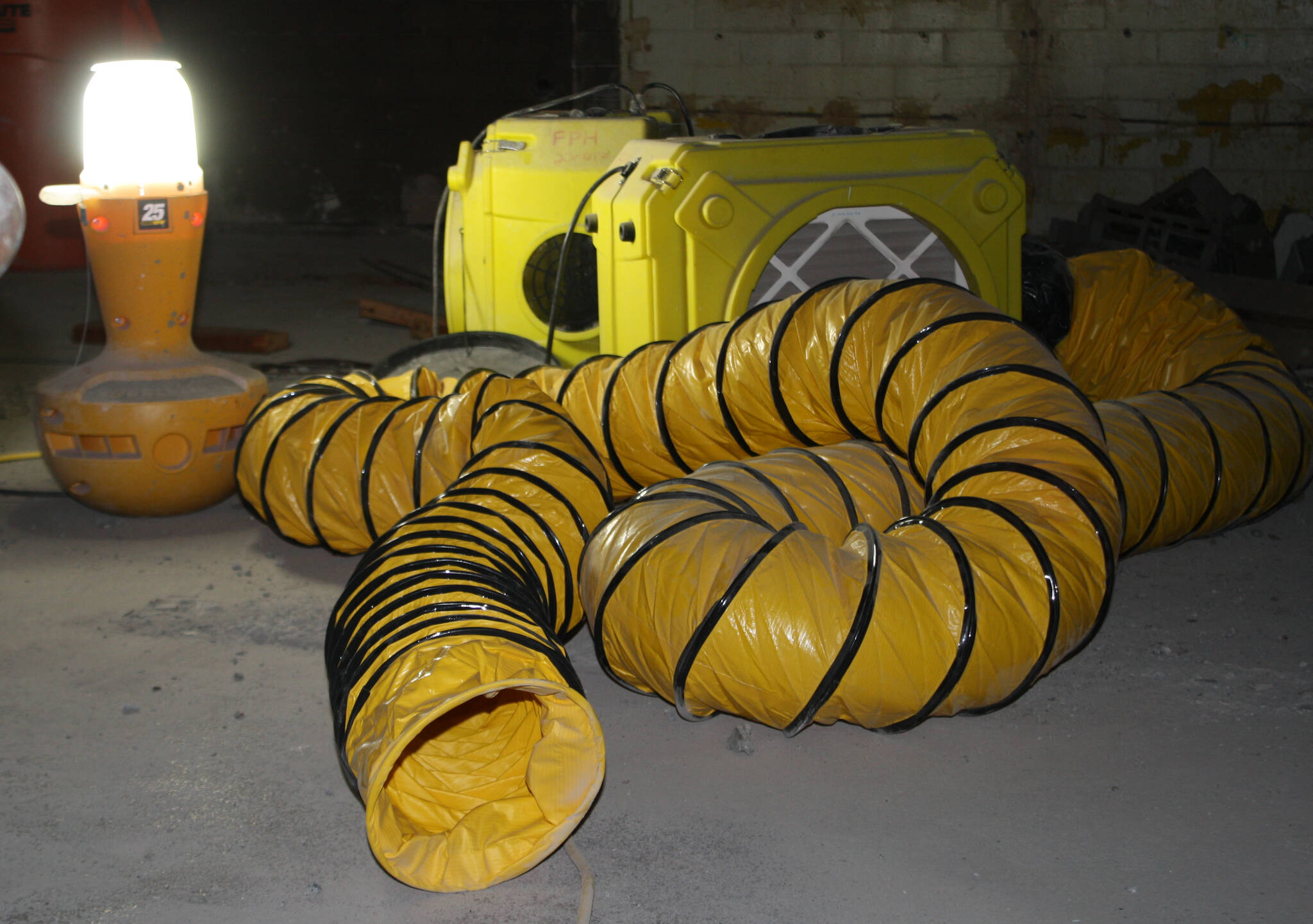 Molly Hetherwick/Kitsap News Group photos
A ventilator tube is prepared to funnel dust out of the enclosed space when renovation begins.