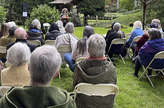 Bloedel courtesy photo 
Bainbridge Island poet laureate Michele Bombardier welcomes guests to a poetry reading at the Bloedel Reserve honoring renowned poet Theodore Roethke, who died there in 1963.