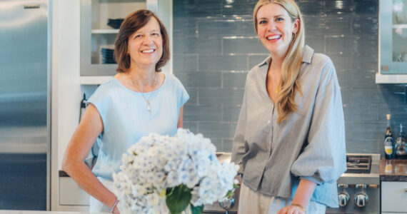 Lisa Paxson and Tiana Gallagher of Coldwell Banker Bain REALTORS’® approach their work with community understanding and depth of knowledge. Photo courtesy of Paxson & Gallagher.