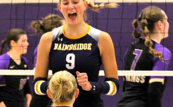 Elisha Meyer/Kitsap News Group
Senior outside hitter Holley McFadden celebrates with senior teammate Lola Batcheller after a Spartan point versus the North Kitsap Vikings.