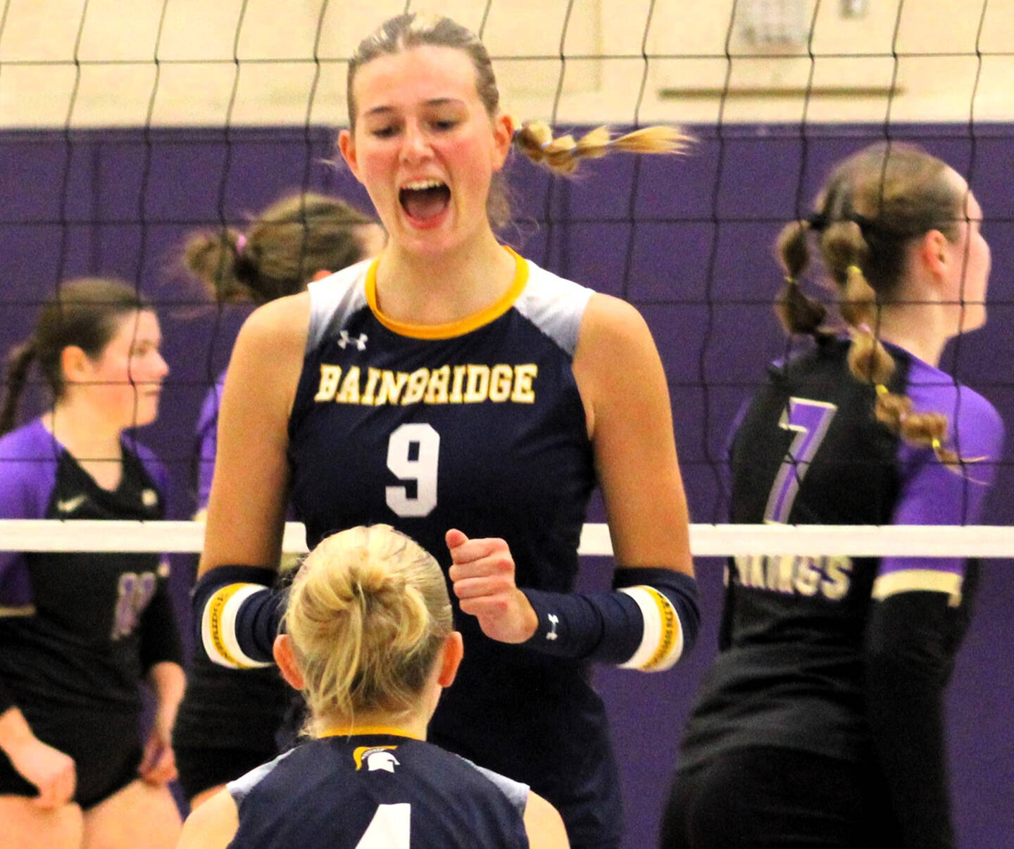 Elisha Meyer/Kitsap News Group
Senior outside hitter Holley McFadden celebrates with senior teammate Lola Batcheller after a Spartan point versus the North Kitsap Vikings.