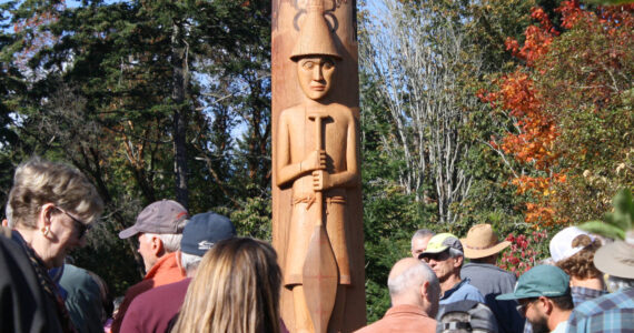 Molly Hetherwick/Kitsap News Group photos
About 200 people watch the Welcome Pole dedication ceremony Oct 9.