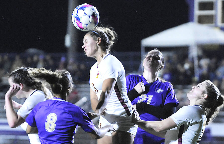 Michael Dashiell/Sequim Gazette courtesy photo
Kingston’s Kate Collins gets her head on the ball in the first half of a Buccaneer 3-2 overtime win in Sequim Oct. 8.