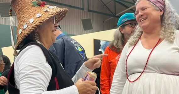 Gina Corpuz courtesy photos
Denita Holmes, right, laughs with an attendee of the festival.