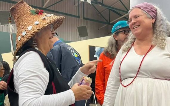 Gina Corpuz courtesy photos
Denita Holmes, right, laughs with an attendee of the festival.