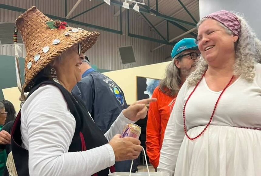 <p>Gina Corpuz courtesy photos</p>
                                <p>Denita Holmes, right, laughs with an attendee of the festival.</p>