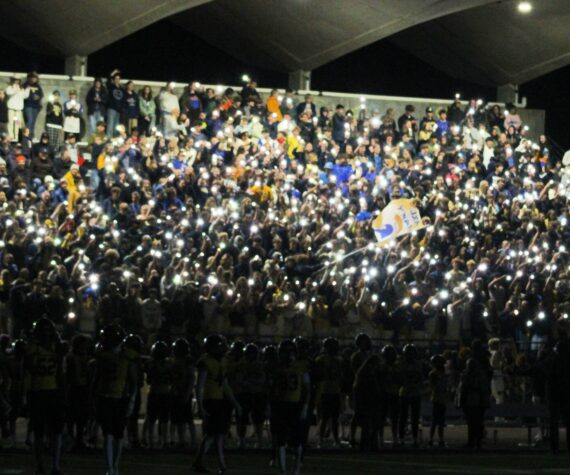 <p>Elisha Meyer/Kitsap News Group photos</p>
                                <p>The Bainbridge High School student section helps illuminate the night in the first of two light outage delays in an Oct. 18 gave vs. North Kitsap.</p>