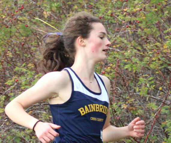 <p>Elisha Meyer/Kitsap News Group photos</p>
                                <p>Junior Sabine Hartenstine approaches the two-mile mark of an Oct. 18 5K course.</p>