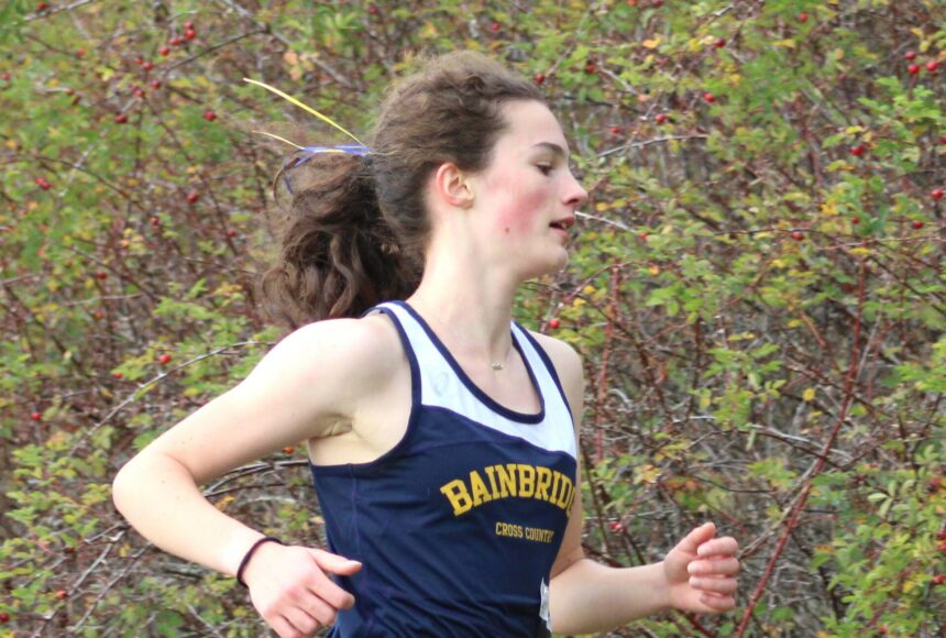 <p>Elisha Meyer/Kitsap News Group photos</p>
                                <p>Junior Sabine Hartenstine approaches the two-mile mark of an Oct. 18 5K course.</p>