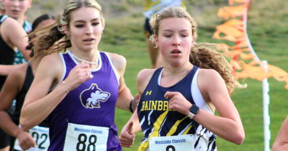 Elisha Meyer/Kitsap News Group photos
Bainbridge sophomore Evelyn Shutske makes her way toward the lead of the pack in the early parts of the 2A girls district race.