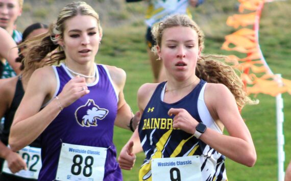 Elisha Meyer/Kitsap News Group photos
Bainbridge sophomore Evelyn Shutske makes her way toward the lead of the pack in the early parts of the 2A girls district race.