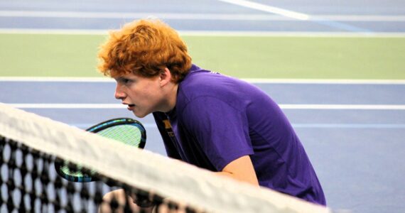 Elisha Meyer/Kitsap News Group
North Kitsap’s Mason Repp crouches down while awaiting the serve from his partner Justin Gallant on day one of the 2024 district tournament.