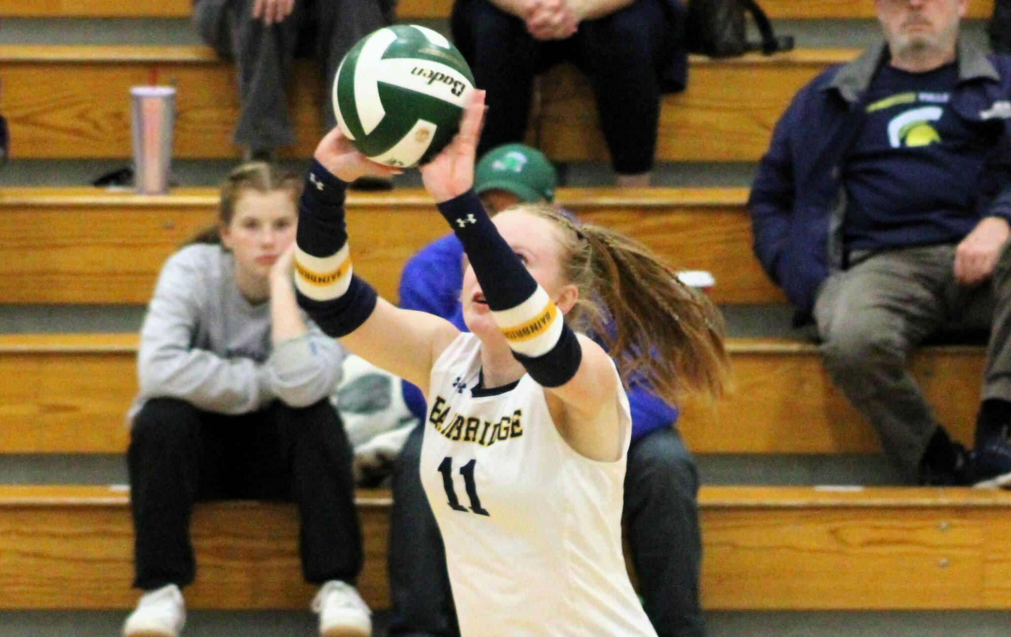 Bainbridge junior Rollins Anderson sets the ball toward the opponent’s side of the net.