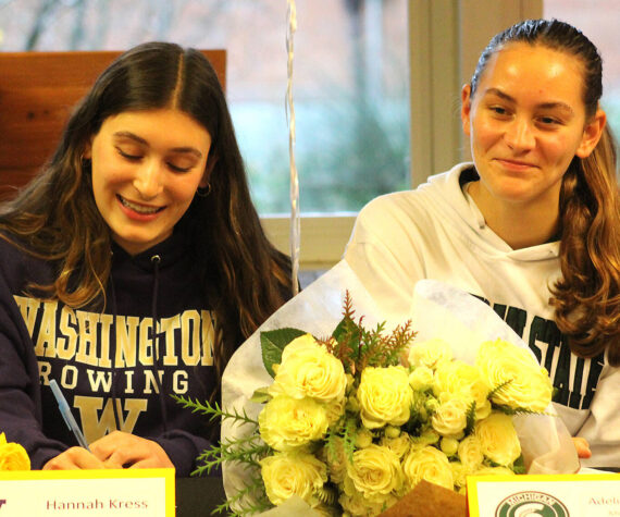 Elisha Meyer/Kitsap News Group
Bainbridge’s Hannah Kress and Adeline Carleton celebrate their rowing commitments to Washington and Michigan State.