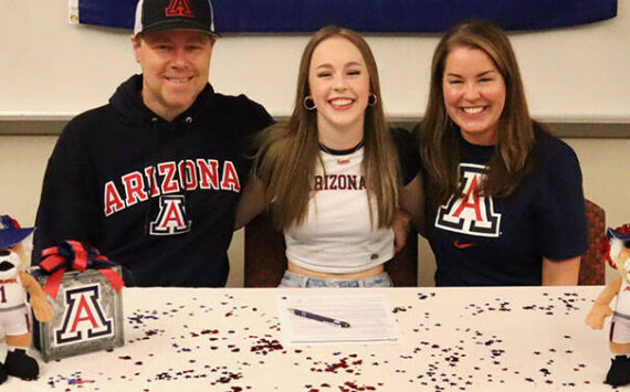 Mead Family courtesy photo
Kingston senior Delaney Mead (middle) signed her letter of intent to attend the University of Arizona Nov. 13 at Kingston High School. Joining her was dad Cory and mom Shannon.