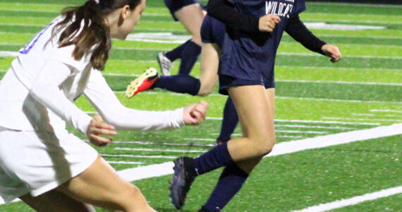 Elisha Meyer/Kitsap News Group
Crosspoint eighth-grader Rylie Phillips tracks a ball kicked by Mount Vernon in the first half of a state semifinal contest.