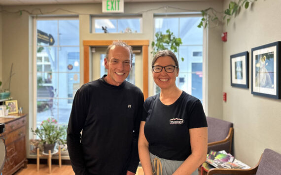 Dr. Soomer-Lincoln is standing beside her patient after his procedure. Photo courtesy of Fairy Tale Dental.