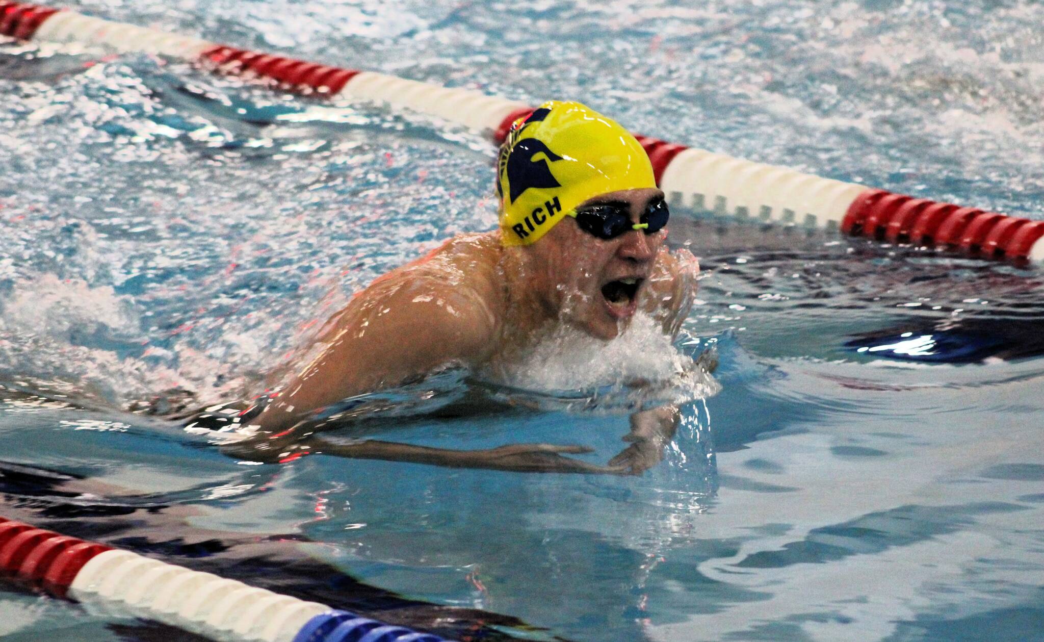 Elisha Meyer/Kitsap News Group
Bainbridge junior Ryan Rich swims to victory in the 100-yard breaststroke against Olympic.