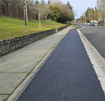 Raised bicycle lanes have been completed north of High School Road on Madison Avenue. Bike lane painting and striping will occur this spring. The mountable curb improves bike and pedestrian safety, allowing bikers to enter the vehicle lane for passing and turning.
COBI courtesy photo