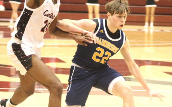 Luke Caputo/Kitsap News Group photos
Bainbridge Spartan Luke Johnson evades a defender in a 47-41 loss to the Franklin Pierce Cardinals Feb. 28 at the University of Puget Sound in Tacoma.